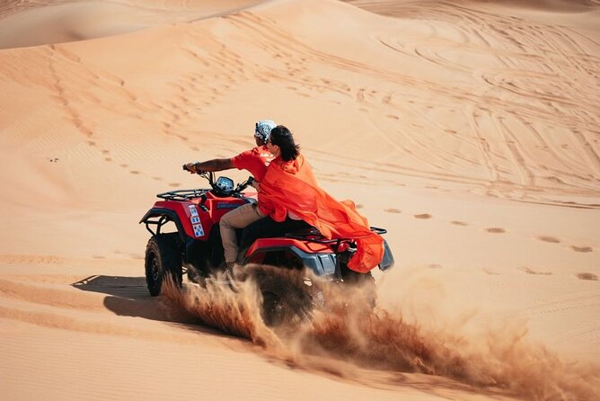 Quad Bike Thrill: 30/60-Minute Red Dune Adventure with Camel Ride - The camel ride adds the cultural side