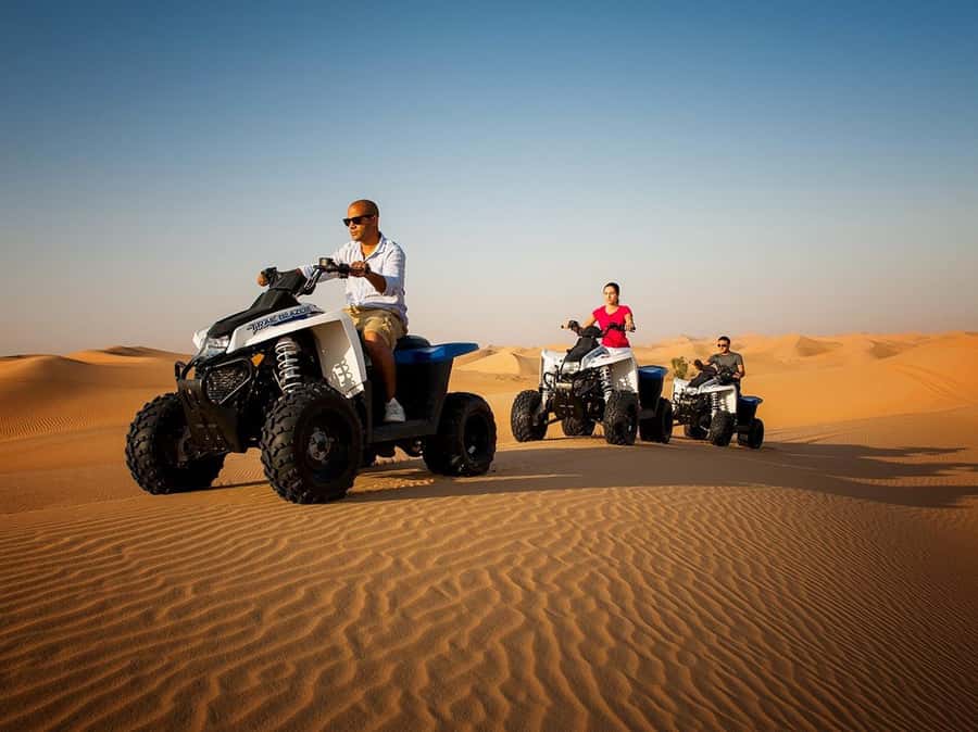 Ras Al Khaimah: Guided Quad Bike Tour - Riding into Ras Al Khaimah’s red dunes