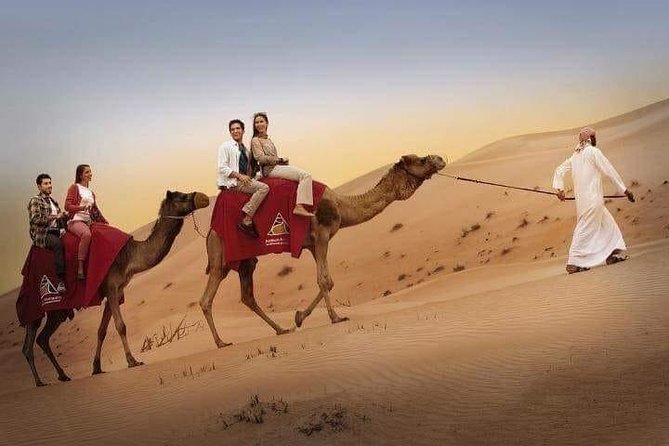 Red Dune Desert Safari with BBQ Dinner, Sand Boarding Dance Shows - BBQ buffet dinner on carpets and floor cushions