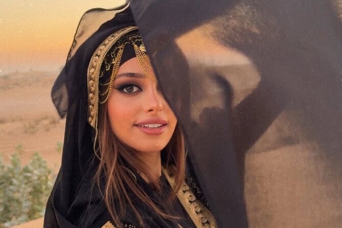 Red Dunes Desert Safari 4x4 Pickup & Drop, Camel Ride BBQ & Shows - Henna, costumes, and a simple cultural touch