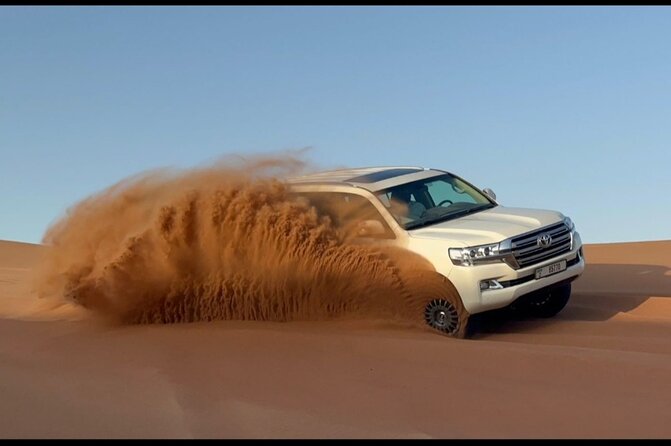 Red Dunes Desert Safari Dubai with Dinner Buffet, Show & Transfer - Timing, cancellation, and practical planning