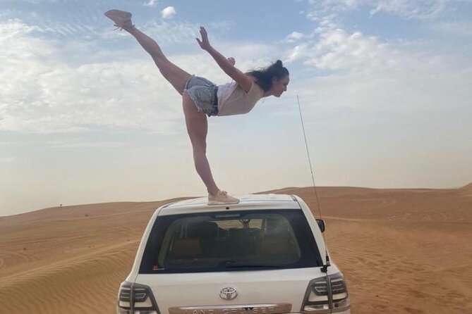 Red Dunes Desert Safari with 4x4 Pick up & Drop, Camel ride, BBQ and Live shows - Red dunes, shared transport, and a six-hour evening