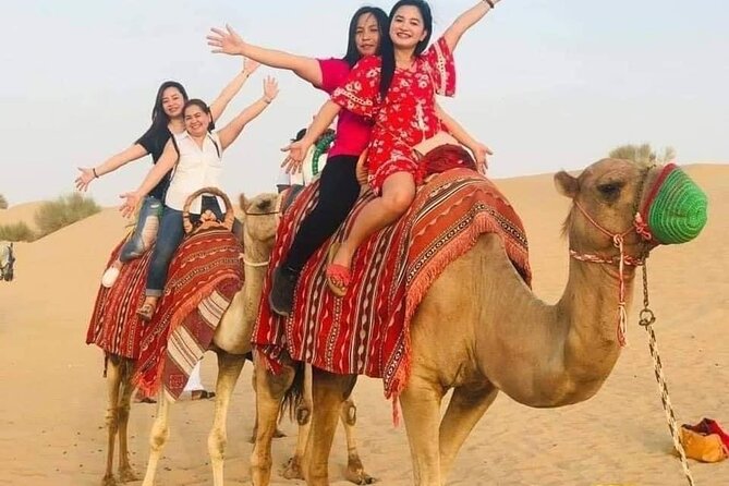 Red Sand Lahbab Desert Safari Adventure - Sandboarding and the middle-of-the-dune photo stop