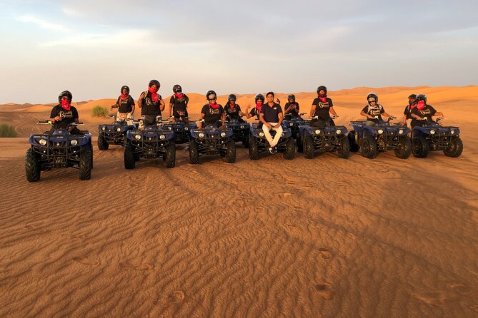 Self-drive Quad Bike with Sand Boarding and Camel Ride in Dubai - Sandboarding after the quad ride