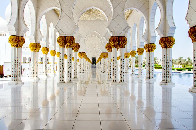 Sheikh Zayed Mosque Half Day Tour in Abu Dhabi - The white marble courtyard and floral details