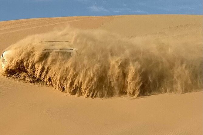 Sunrise Safari in Abu Dhabi's Desert - Sandboarding and the camel ride