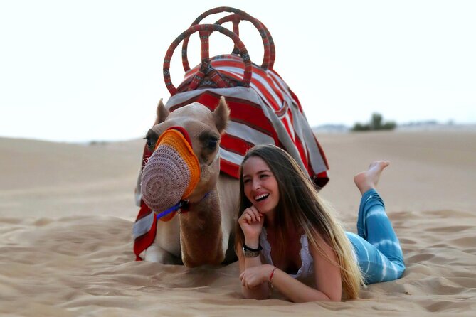 Sunset Camel Trek & Red Dunes Safari with BBQ at Al Khayma Camp From Dubai - What the guide adds to the day