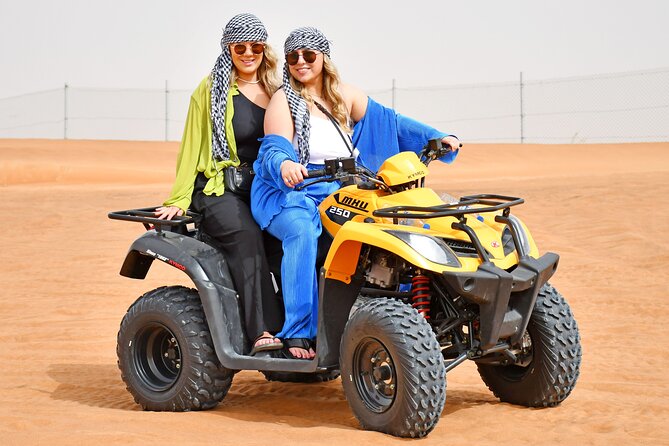 Sunset Desert Safari Quad bike Camel ride Sand Board & BBQ Dinner - Al Awir after dark: camel rides and camp time