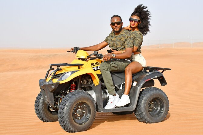 Sunset Desert Safari Quad bike Camel ride Sand Board & BBQ Dinner - Four live shows and an easygoing camp atmosphere