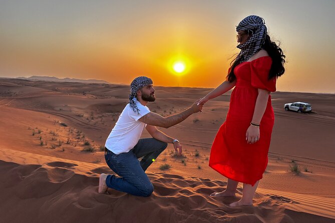 Sunset Desert safari with Camel Ride Sand Board & BBQ Dinner - Dune bashing: hold on for the rough ride