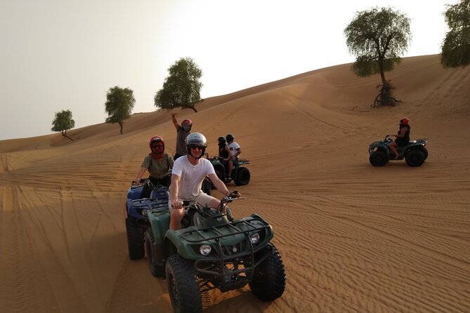Sunset Quad/Buggy Tour & BBQ Evening - A short camel ride for desert tradition