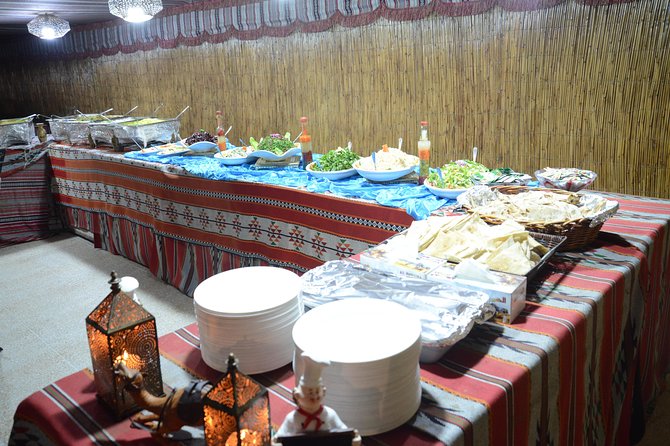 Wow Arabian Nights Tours Desert Safari Program with BBQ Dinner - Camel rides and sandboarding on the dunes